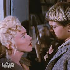MARILYN MONROE PHOTO OF THE DAY — Marilyn Monroe (Kay Weston) and Tommy  Rettig (Mark Calder) share a deep scene in "River of No Return" (1954).  Photo by: 20th Century Fox (1954)
