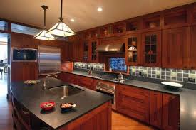 Kitchen with cherry cabinets and grey granite. Pin By Ninon Paulsen Mcginn On New Kitchen Ideas Kitchen Cabinet Styles Craftsman Kitchen Interior Design Kitchen