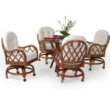 The Jamaica Rattan Caster Dining Set Has Been One Of Our Best Sellers For A Long Time The Comfortable Su Rattan Dining Chairs Wicker Dining Set Caster Chairs