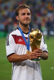 Mario Goetze Of Germany Celebrates With The World Cup Trophy After Mario Gotze World Cup Mario