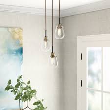 This pendant light fixture has a unique integrated hanging style and 3 10.4'' x 8.1'' globes to meet interior design needs. Vaulted Sloped Ceiling Lighting Joss Main