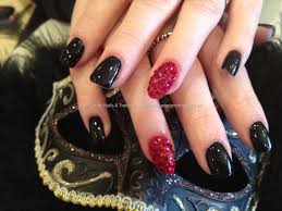 Black Acrylic Nails With Glitter On Ring Finger Black Polish With Red Swarovski Crystal Ring Fingers Over Acrylic Nails Red Acrylic Nails Swarovski Nails Prom Nails Red