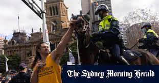 There's heaps and heaps of people, quite a few of whom broke off into different groups. Covid Nsw Two Charged After Striking Horse In Sydney Anti Lockdown Protest