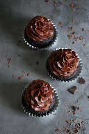 Add the sour cream, buttermilk, eggs, and veggie oil into a large bowl and whisk together. Chocoholic Chocolate Cupcakes Bake To The Roots