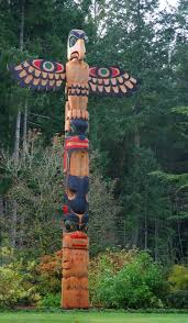 The Meaning Behind Totem Poles A Belief In Animal Spirit Beings Native American Totem Totem Pole Art Native American Totem Poles