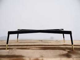 The table top is crafted from engineered wood for contrast with the metal of the base. Brass And Metal Bench Base Stylish And Unique Balasagun