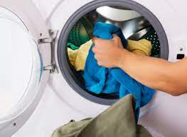How Do I Banish That Weird Musty Smell From My Washing Machine