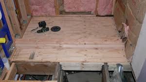 Before installing a tile floor, a subfloor and underlayment is necessary. Plywood Subflooring In Bathroom For Tile And Under Shower Building A Shower Pan Shower Remodel Shower Pan