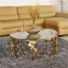 Living room table will certainly impact the style of a living room. Round Coffee Table Sofa End Table Living Room Side Table Modern Luxury Furniture Tempered Glass Table Top And Gold Stainless Steel Frame Coffee Tables China Living Room Furniture Outdoor Furniture