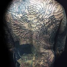 A simple but meaningful design. Top 30 Dragon Back Tattoos For Men