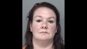 Embezzlement charge for woman accused of hiding death