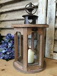 This section contains our stylish and modern votive candle holders. Lantern Candle Holder Tea Light Hurricane Lamp Garden Outdoor Wooden Metal Glass Decorative Storm Lanterns Indoor Vintage Hanging Shabby Wedding Table Centrepiece Venue Decoration Buy Online In Honduras At Honduras Desertcart Com Productid