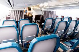 Hawaiian Airlines B717 200 Economy Class Cabin Seats Were Covered In A Fairly Unique Turquois Airline Interiors Hawaiian Airlines Airlines
