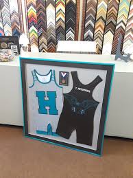 To display a sports jersey, use a shadowbox frame, which is a shallow, framed, rectangular box is usually use. Jersey Frame N Art