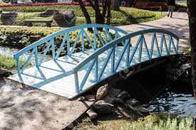 49 backyard garden bridge ideas and designs includes wooden garden bridges, japanese garden bridges, small bridges, red bridges and more. Beautiful Small Wooden Bridge In The Flower Garden Stock Photo Picture And Royalty Free Image Image 72097267