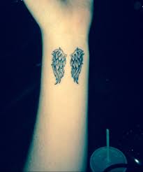 Pin By Patti Cruise On Random Wing Tattoos On Wrist Wrist Tattoos For Women Wings Tattoo