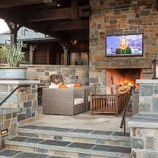Wanting to add stone accents to the inside of your home? Outdoor Fireplace Tv Niche Design Ideas