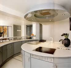 Cuisine Circulaire Construite Autour D Un Ilot Rond En Corian Du Decorateur Christian Daudre Avec Les Marques Poggenpohl Miel Idee Cuisine Cuisine Circulaire