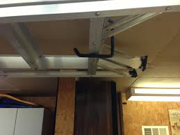 Use hooks to hang the ladder on the wall; Hanging A Ladder From The Ceiling Wilker Do S