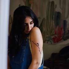 Photos (year): 2021 📸: @mallorywild SO! I'm getting asked a lot about my  tattoo these days. Probably cuz I'be been fortunate to have made new  friends in Atlanta, and discussing someone's tattoo