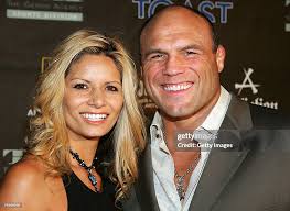 heavyweight champion Randy Couture and his wife Kim Couture arrive at...  News Photo