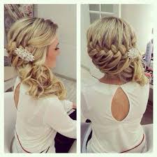 Taking classic looks and adding new details, like this twisted knot, gives them a new lease of life and a vintage bridal hairstyles for long hair are having a resurgence right now, and they really add something more to your wedding look. 30 Hottest Bridesmaid Hairstyles For Long Hair Popular Haircuts Glamorous Wedding Hair Hair Styles Long Hair Styles
