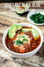 Slow Cooker Vegetable Tortilla Soup Is The Perfect Hearty Healthy Meal With Only 100 Cal In 2020 Vegetable Tortilla Soup Healthy Hearty Meals Vegetarian Tortilla Soup