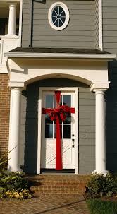 For an easy outdoor christmas decoration, we secured some strands to a trellis with zip ties. 41 Christmas Door Decoration Ideas Pretty Holiday Front Doors