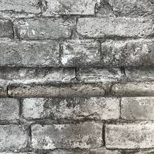 Black and brown brick wall, old, dark, brick wall background. Black Grey Brick Effect Wallpaper Fine Decor