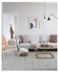 Nordic space on the terrace with a large firewood stack and outdoor wooden chairs with brown lambskin. What Scandinavian House Decor Actually Looks Like Scandinavian In 2021 Scandanavian Interiors Living Room Nordic Style Living Room Scandinavian Interior Living Room