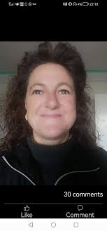 Family or solo pics by the leaning pink house today tomorrow