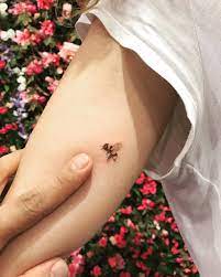 116 bumblebee tattoos pictures, designs and ideas. Bumblebee Tattoo On The Inner Arm