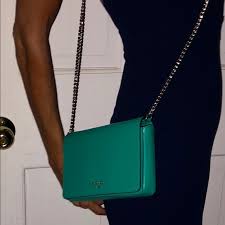 Its soft texture is nice to touch and durable against drops and scratches so it'll keep its sleek, luxe look. Kate Spade Bags Kate Spade Spencer Chain Wallet Poshmark