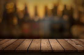 Wooden Table With A View Of Blurred Beverages Bar Backdrop Panos De Fundo Ideias De Hamburguer Fundo Madeira