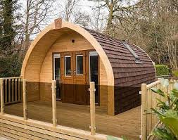 Garden log cabin with veranda and shed super eva e 18m² / 9x3m / 44mm. Bespoke Eco Lodge Homes In The Uk