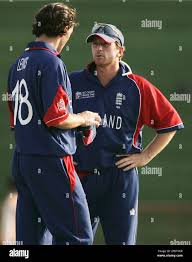 England's Paul Collingwood, right, and Jon Lewis discuss tactics against  Australia in a Cricket World Cup warm-up match at Arnos Vale in St. Vincent,  Friday, March 9, 2007. Australia won the match