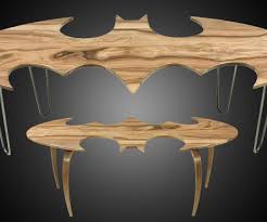 But, for a few bucks at the thrift store and in art supplies, you can make your very own. Rest Your Batman Comic Books On These Bat Shaped Coffee Tables
