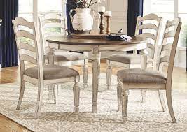 Sillas / bancos para barra. Mesa De Comedor Ovalada Extensible Realyn Ashley Furniture Homestore Independently Owned And Operated By Scs Furniture Store Sa
