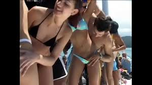 Naghty sunburnt girls in Hawaiian skirts enjoy neverending group sex orgy  on the cruising boat - XNXX.COM