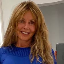 Carol Vorderman shows off hard rock abs after week-long retreat in Portugal 