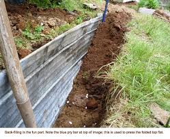 Above ground, grass barrier creates a defined grass line and area to retain mulch, gravel or soil. How To Block Tree Roots From Entering Your Garden Eartheasy Guides Articles Eartheasy Guides Articles