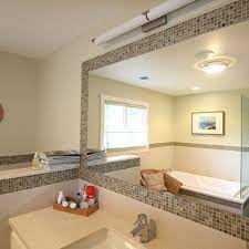 The top section of the wainscot (subway tile, marble liner, another subway tile) will continue around the vanity as a backsplash. Tile Around Mirror To Update Boring Mirrors Next Project Bathroom Tile Designs Bathrooms Remodel Home Remodeling