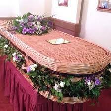 You can string flowers and other decorations into the casket. Funeral Flowers Wicker Casket Side Floral Decorations And Posy Spray