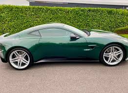 Image result for Hardly Green 2011 Aston Martin
