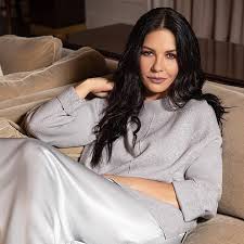 My girl, in the garden. Catherine Zeta Jones Launches Fashion Line Photo 1