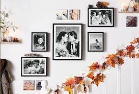 Simple, chic frames make for stunning wall art. 30 Family Photo Wall Ideas To Bring Your Photos To Life Shutterfly Family Photo Wall Decor Photo Wall