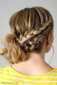 However simply buns can be, you can always incorporate a braid to add a bit of flair to your hair. Double Braided Side Bun