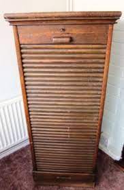 Tambour fronted oak art deco filing cabinet this is a good looking piece, the interior has 9 sliding drawers, it has a tambour front which locks the a good antique french walnut twin tambour fronted filing cabinet, circa 1910. Antique Tambour Roll Front Filing Cabinet 168800534