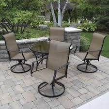 Set The Scene With The Subtle Yet Refined Look Of The Taylor Dining Collection The Understated Design Of T Patio Patio Furniture Collection Backyard Creations