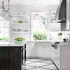 Black appliances look great with painted gray cabinets. Black And White Painted Kitchen Floor Design Ideas